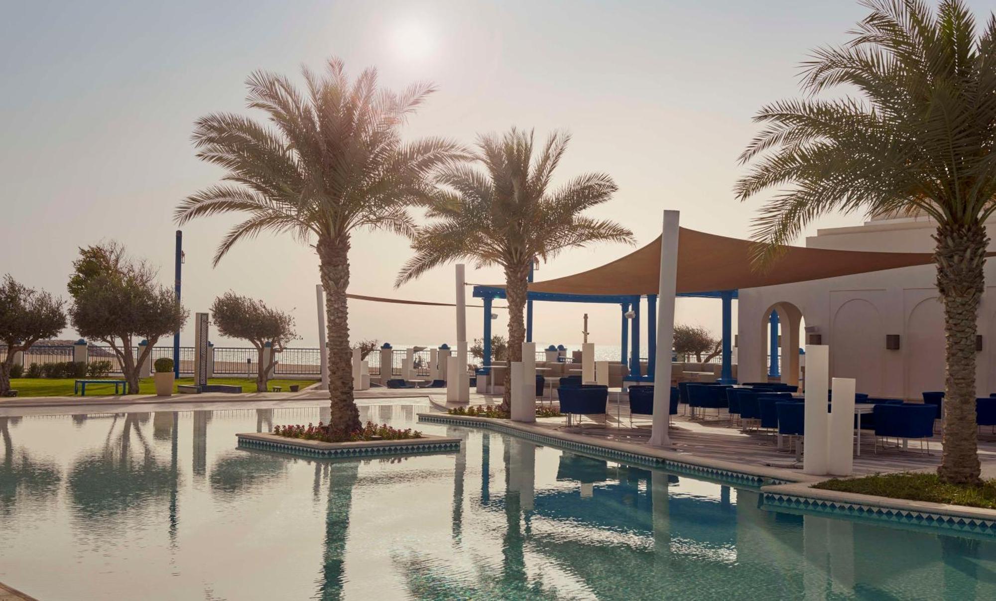 Hilton Salwa Beach Resort And Villas Abu Samra Bagian luar foto The Cove Rotana Resort