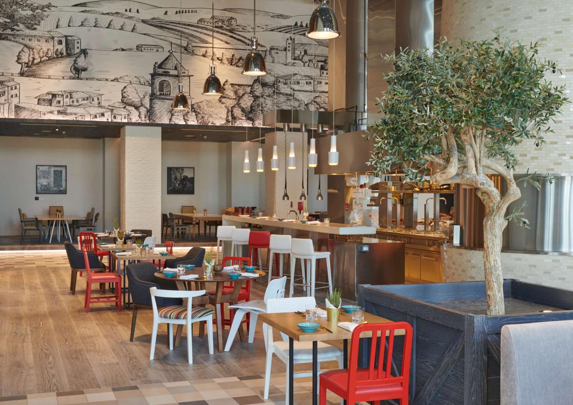 Hilton Salwa Beach Resort And Villas Abu Samra Bagian luar foto Restaurant